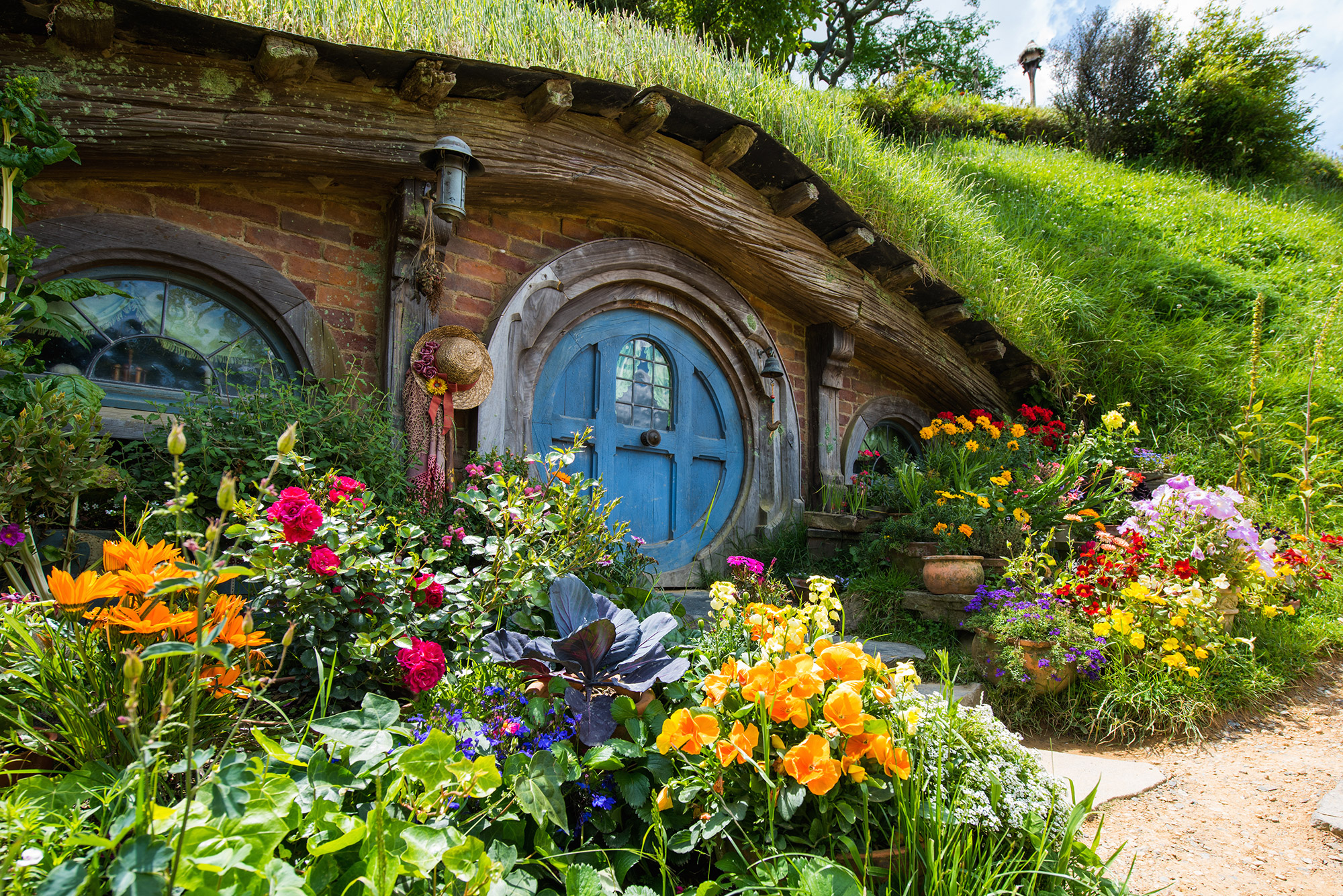 Hobbit home on the Hobbiton Movie Set Tour from Auckland A hobbit home on the Hobbiton movie set
