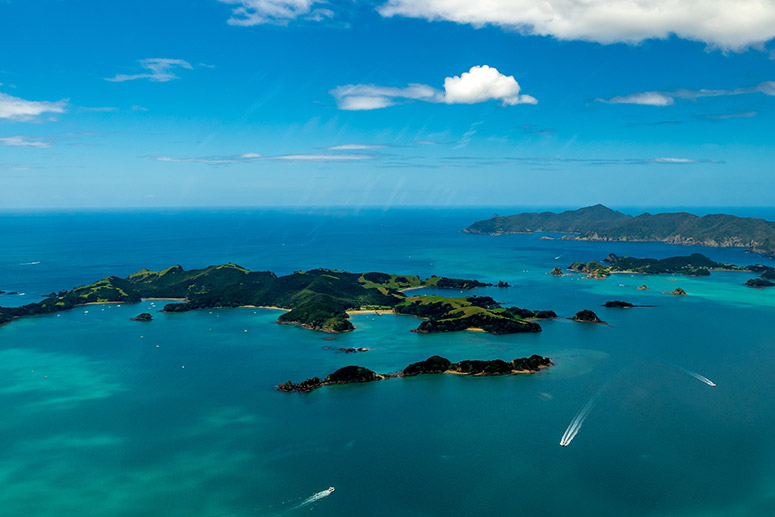 Islands in the ocean seen from the air, Bay of Islands, New Zealand