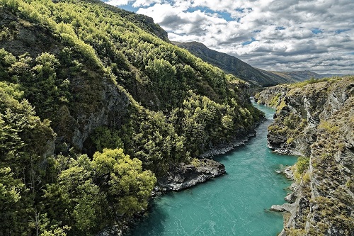 View of waterways through mountains at Te Anau